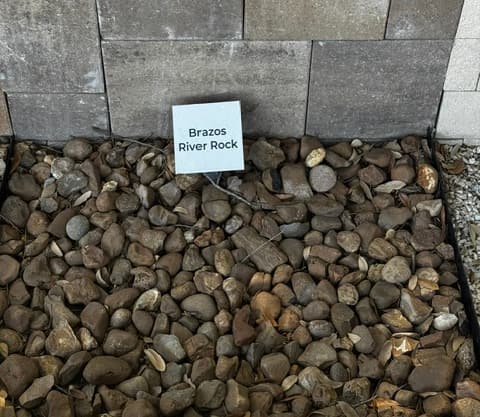 Brazos River Rock decorative stone sample on display at Land Care Garden Center in Flower Mound, TX