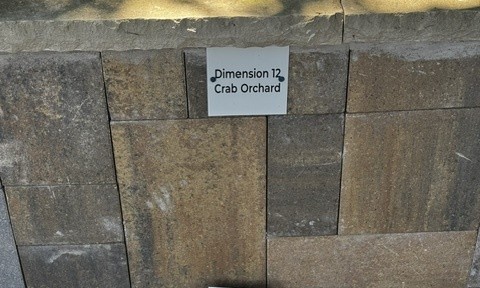 Dimension 12 Crab Orchard cut stone sample on the building stone display wall at Land Care Garden Center in Flower Mound, TX